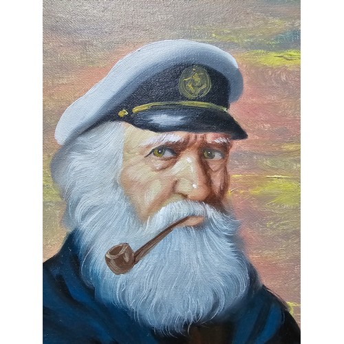 83 - A framed oil on canvas oil painting of a sailor with a pipe in his mouth. The painting is very well ... 