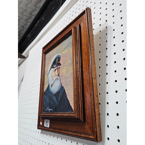 83 - A framed oil on canvas oil painting of a sailor with a pipe in his mouth. The painting is very well ... 