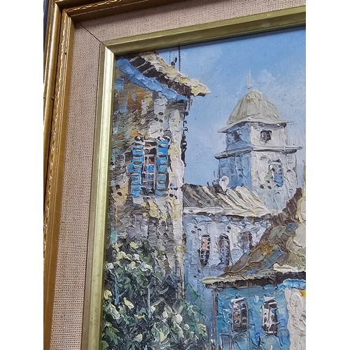 87 - A framed oil on board pallet knife painting of a coastal scene signed to the lower right. In a good ... 