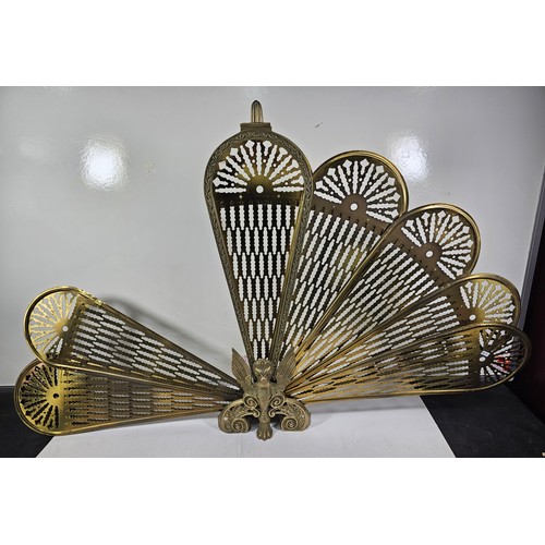 90 - A brass peacock fireguard. All pieces are present but some require re-attaching,. The phoenix image ... 