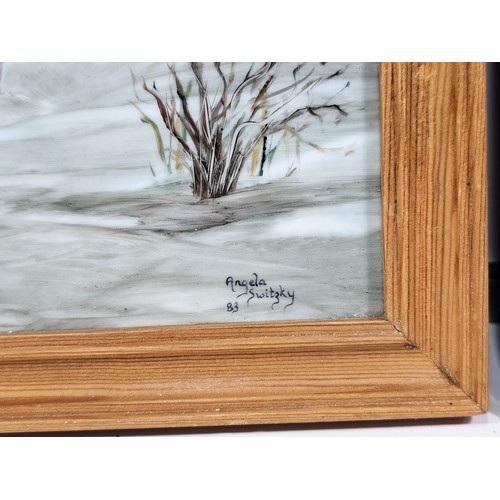 91 - A collection of 3 tiled pictures to include a hand painted framed tile picture of 2 puffins signed t... 