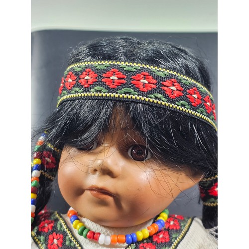92 - A pair of dolls by the Regal Toy Company. Both dolls are in the form of Native Indians. One is in a ... 