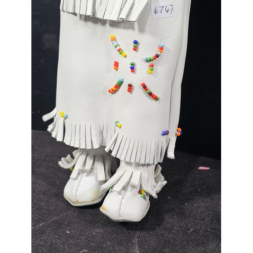 92 - A pair of dolls by the Regal Toy Company. Both dolls are in the form of Native Indians. One is in a ... 