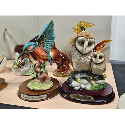 97 - A shelf full of collectables to include 2 ceramic figurines, one of a Squirrel and one of a Kingfish... 