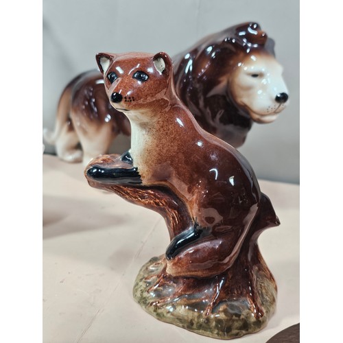 97 - A shelf full of collectables to include 2 ceramic figurines, one of a Squirrel and one of a Kingfish... 