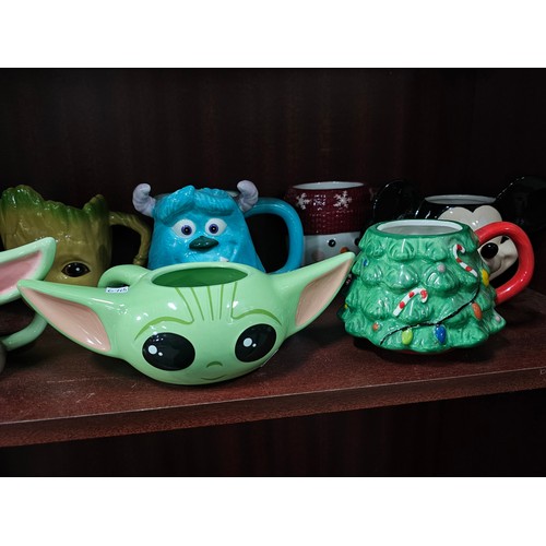 100 - A collection of 10 character mugs to include 3 Star Wars mugs of Baby Yoda, a Disney Mickey and Frie... 