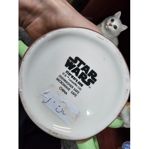 100 - A collection of 10 character mugs to include 3 Star Wars mugs of Baby Yoda, a Disney Mickey and Frie... 