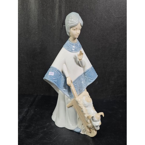 102 - A large quantity of collectables to include an Italian Pottery piece of a lady pushing a Wheelbarrow... 