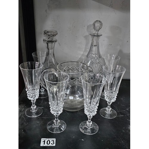 103 - A small quantity of glassware to include 2 cut glass crystal decanters complete original stoppers an... 