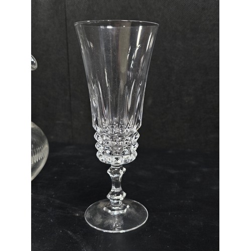 103 - A small quantity of glassware to include 2 cut glass crystal decanters complete original stoppers an... 