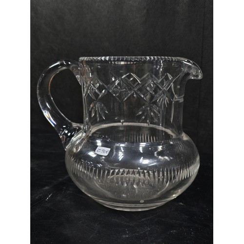 103 - A small quantity of glassware to include 2 cut glass crystal decanters complete original stoppers an... 