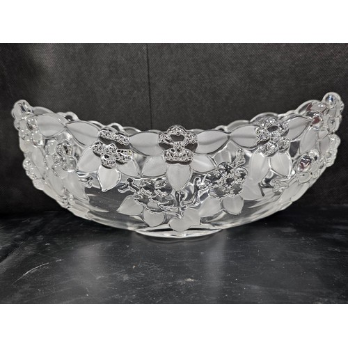 105 - A quantity of glassware to include a cut glass crystal decanter complete with stopper along with 4 g... 