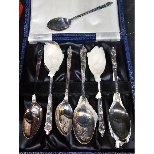 106 - A quantity of silver plated ware to include 2 table top candelabras with 2 matching single stem cand... 