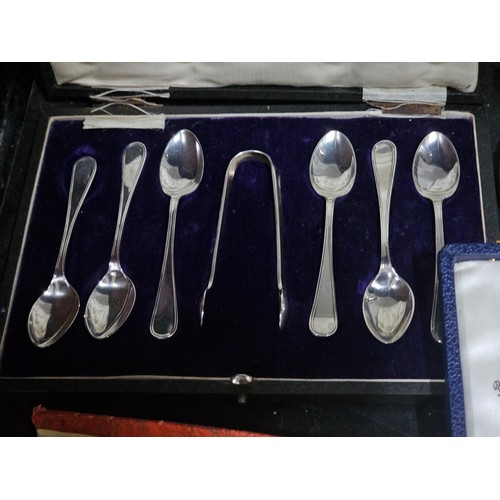 106 - A quantity of silver plated ware to include 2 table top candelabras with 2 matching single stem cand... 