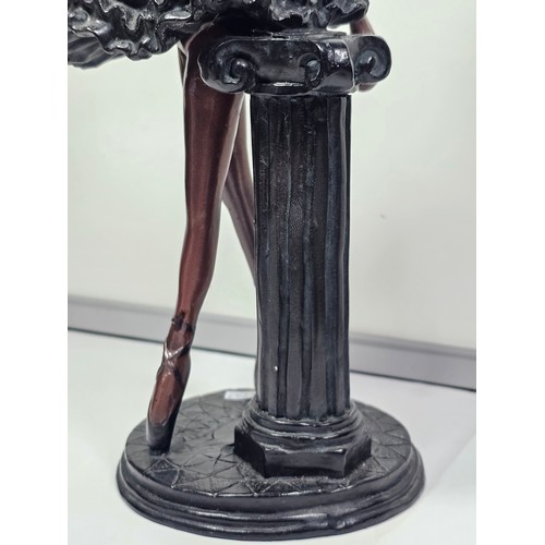 108 - A collection of 4 figurines in resin to include a Ballerina standing by a column, a dancer sitting o... 