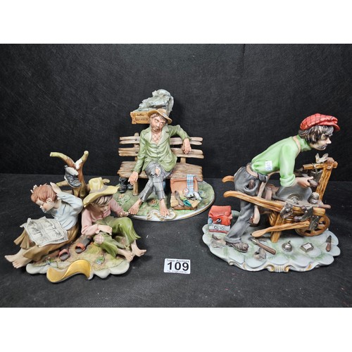 109 - A collection of 3 Capodimonte figurines to include a craftsman along with a tramp on a park bench an... 