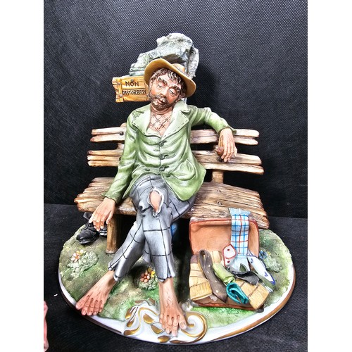 109 - A collection of 3 Capodimonte figurines to include a craftsman along with a tramp on a park bench an... 
