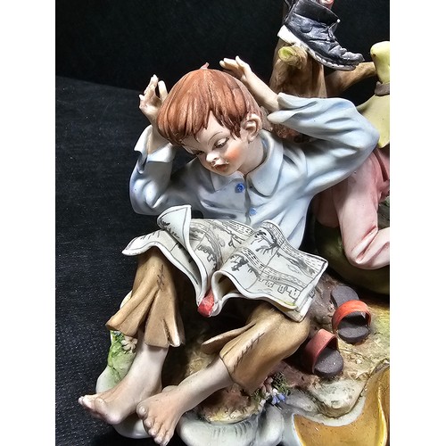 109 - A collection of 3 Capodimonte figurines to include a craftsman along with a tramp on a park bench an... 
