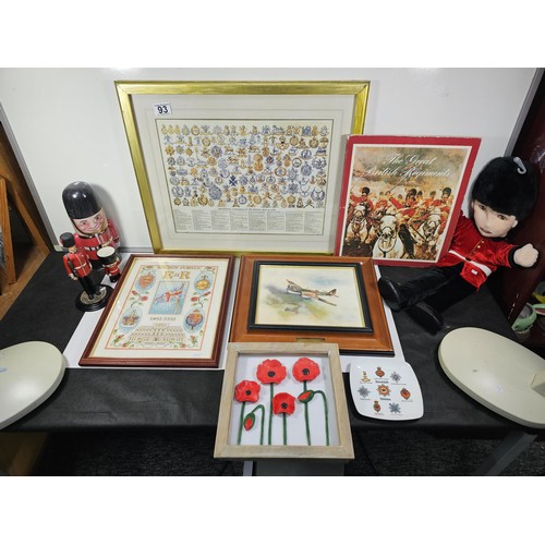 93 - A collection of military and royal related items to include a framed and glazed regimental cap badge... 