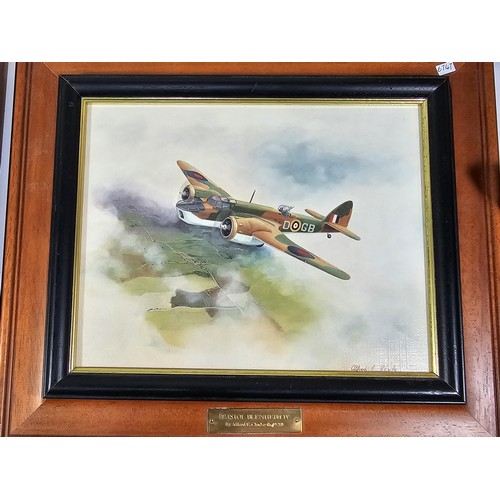 93 - A collection of military and royal related items to include a framed and glazed regimental cap badge... 
