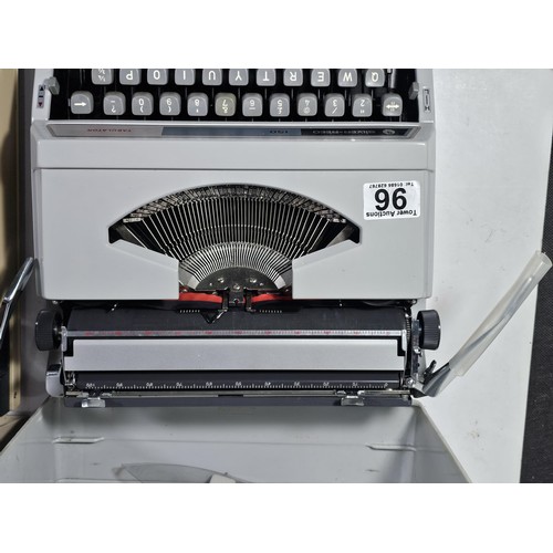 96 - A pair of vintage cased typewriters to include a Maritso 30 type typewriter along with a Silverreed ... 