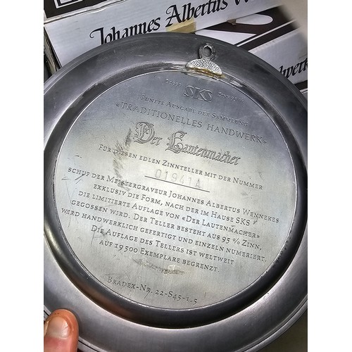 116 - A collection of 8x tin plates each with a different trade design to the front to include Glassblower... 