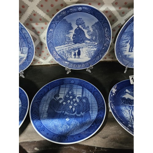 118 - A collection of 10x Christmas themed Royal Copenhagen plates all with different Christmas related pi... 