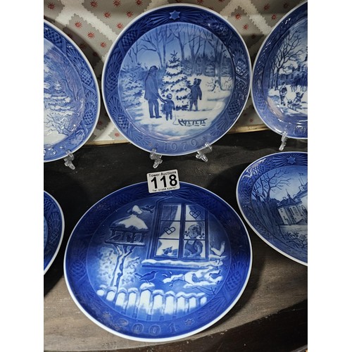 118 - A collection of 10x Christmas themed Royal Copenhagen plates all with different Christmas related pi... 