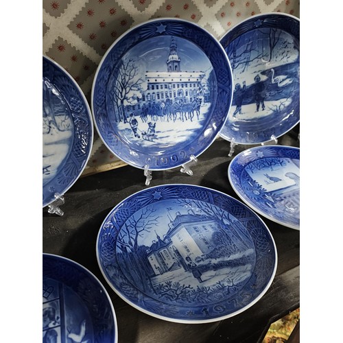 118 - A collection of 10x Christmas themed Royal Copenhagen plates all with different Christmas related pi... 