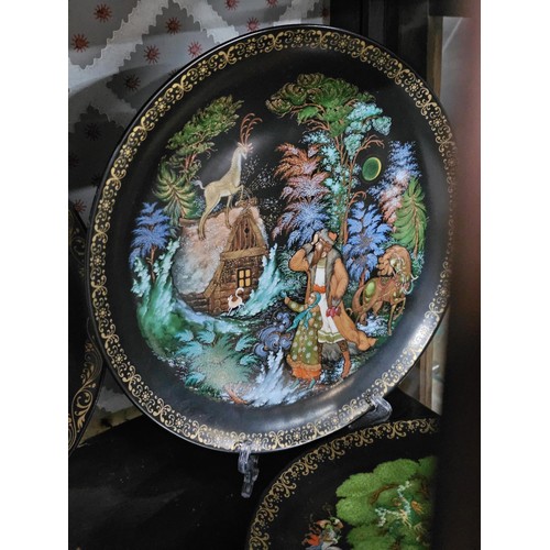 119 - A collection of 17x hand painted picture plates to include a set of 10x Russian picture plates by Ga... 