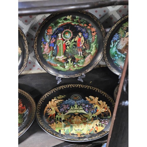 119 - A collection of 17x hand painted picture plates to include a set of 10x Russian picture plates by Ga... 