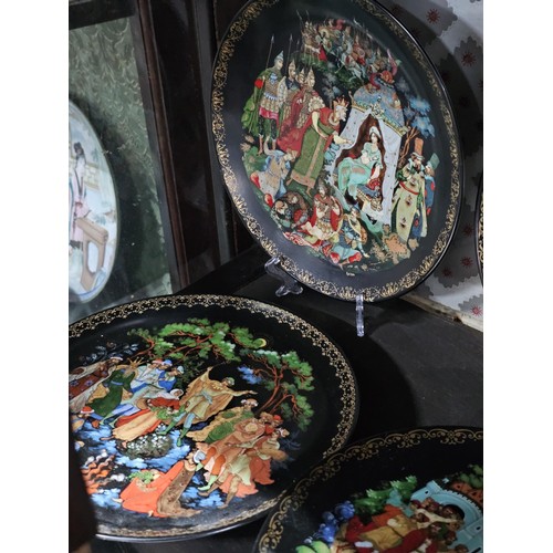 119 - A collection of 17x hand painted picture plates to include a set of 10x Russian picture plates by Ga... 