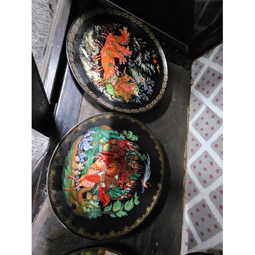 119 - A collection of 17x hand painted picture plates to include a set of 10x Russian picture plates by Ga... 