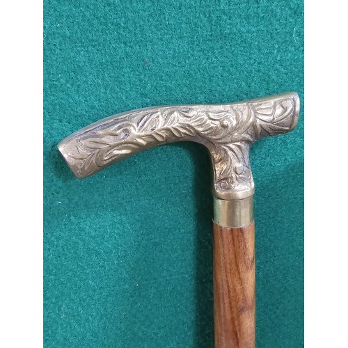 120 - A collection of 4x good quality as new walking sticks to include two with brass handles and 2x with ... 