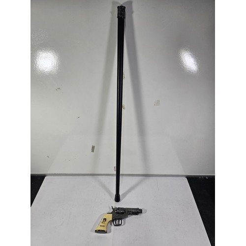 122 - A good quality novelty walking stick in the form of a handgun with a plastic grip with the name Bill... 