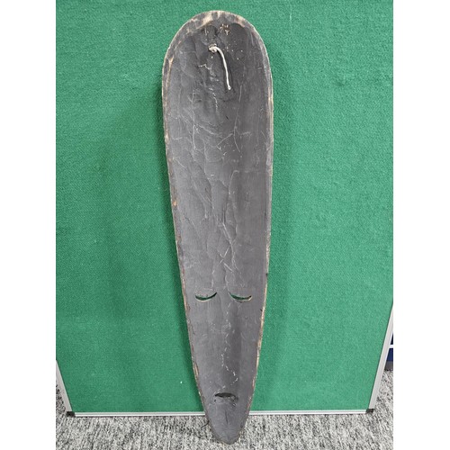 123 - A good quality hand carved wooden wall hanging face mask with engraving to the front all in good ord... 