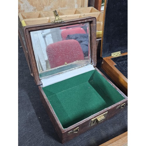 131 - A collection of trinket boxes to include a large light oak lidded box containing a quantity of brass... 