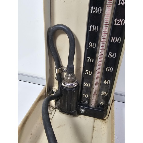 132 - A vintage Zenith A blood pressure monitor kit, appears to be complete with armband and pump, along w... 