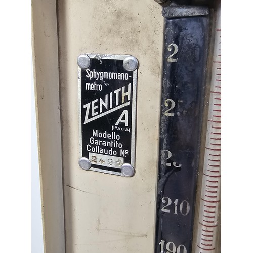 132 - A vintage Zenith A blood pressure monitor kit, appears to be complete with armband and pump, along w... 