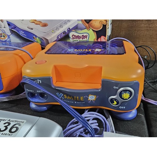 136 - A Vtech V.smile Pro TV 3D learning system, comes with joysticks, controllers, 2 docking systems and ... 