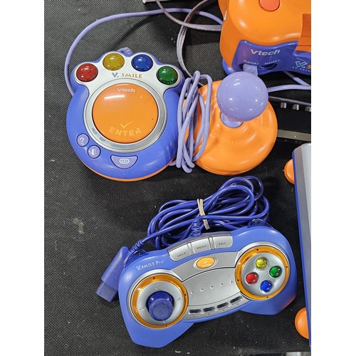 136 - A Vtech V.smile Pro TV 3D learning system, comes with joysticks, controllers, 2 docking systems and ... 