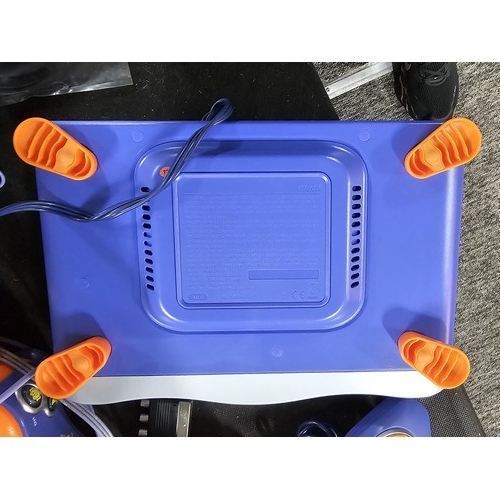 136 - A Vtech V.smile Pro TV 3D learning system, comes with joysticks, controllers, 2 docking systems and ... 