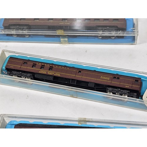 138 - A collection of eight N gauge model railway carriages all relating to the Pennsylvania line, to incl... 