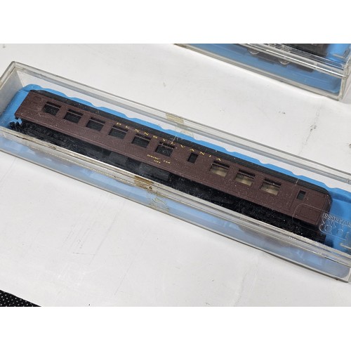 138 - A collection of eight N gauge model railway carriages all relating to the Pennsylvania line, to incl... 