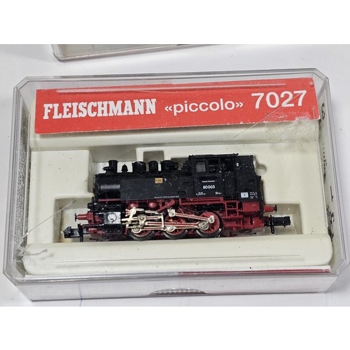 139 - A collection of fifteen N gauge locomotives and carriages predominantly by Fleischnmann (piccolo), t... 