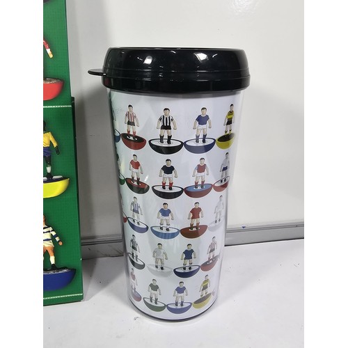 143 - A Flick to Kick history of Subbuteo book along with Subbuteo wrapping paper and matching gift bag, a... 