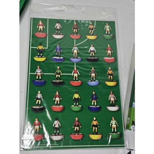 143 - A Flick to Kick history of Subbuteo book along with Subbuteo wrapping paper and matching gift bag, a... 