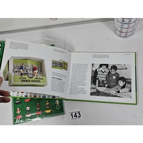 143 - A Flick to Kick history of Subbuteo book along with Subbuteo wrapping paper and matching gift bag, a... 