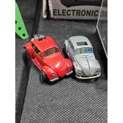 149 - A collection of diecast cars to include 6 cars in perspex cases, a Ferrari, Mini, Fiat Punto rally c... 