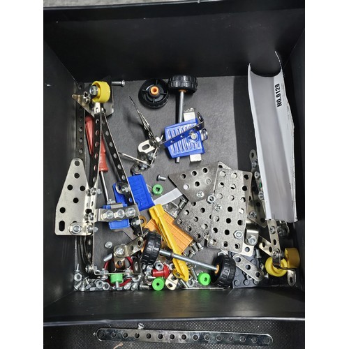 150 - A box containing a quantity of Meccano style Metal Toy pieces complete with instructions for 5x diff... 